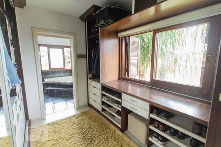 Casa de condomínio à venda com 304m², 4 quartos e 3 vagasCloset da suíte