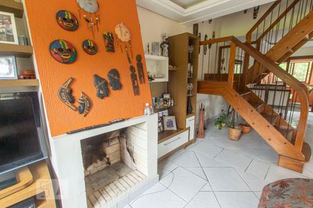 Detalhe Sala de casa de condomínio à venda com 4 quartos, 304m² em Cavalhada, Porto Alegre