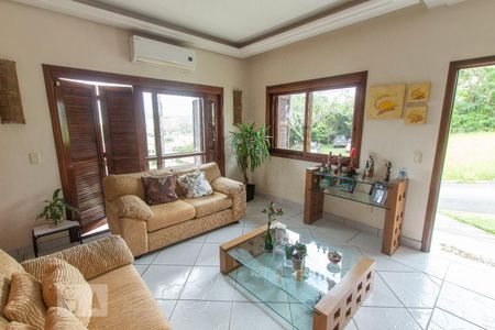 Sala de casa de condomínio à venda com 4 quartos, 304m² em Cavalhada, Porto Alegre