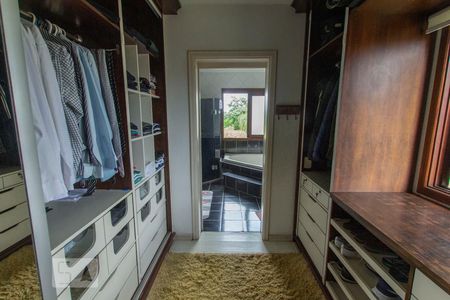 Casa de condomínio à venda com 304m², 4 quartos e 3 vagasCloset da suíte