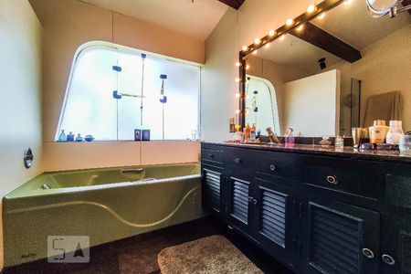 Casa de condomínio à venda com 450m², 4 quartos e 4 vagasBanheiro Suíte 2