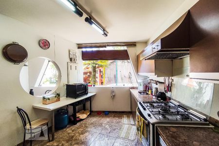 Casa de condomínio à venda com 450m², 4 quartos e 4 vagasCozinha integrada