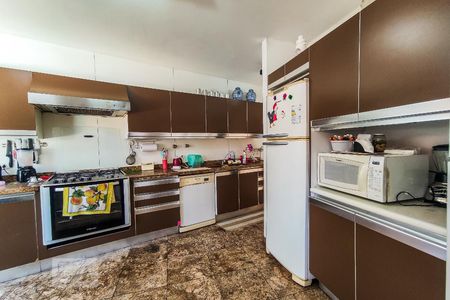 Casa de condomínio à venda com 450m², 4 quartos e 4 vagasCozinha integrada