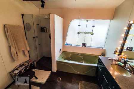 Casa de condomínio à venda com 450m², 4 quartos e 4 vagasBanheiro Suíte 2