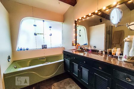 Casa de condomínio à venda com 450m², 4 quartos e 4 vagasBanheiro Suíte 2