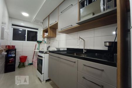 Apartamento à venda com 48m², 2 quartos e 1 vaga Apartamento à venda com 48m², 2 quartos e 1 vagaCozinha e Área de Serviço