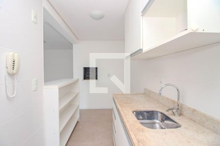 Cozinha e Área de serviço de apartamento para alugar com 2 quartos, 66m² em Rio Branco, Porto Alegre