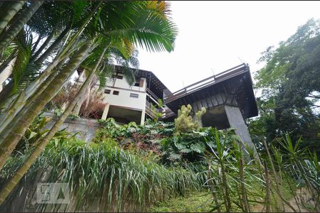 Casa de condomínio à venda com 379m², 4 quartos e 2 vagasFachada