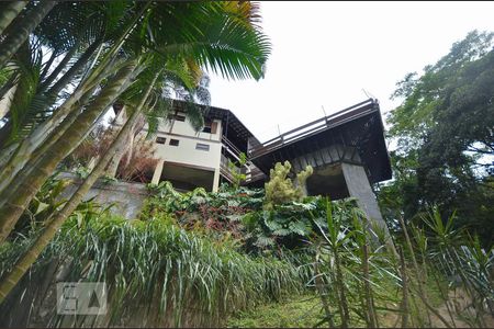 Casa de condomínio à venda com 379m², 4 quartos e 2 vagasFachada