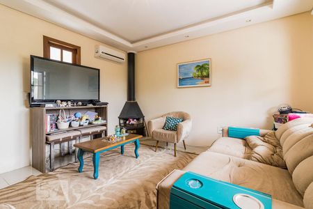Sala de casa para alugar com 3 quartos, 181m² em Campo Novo, Porto Alegre