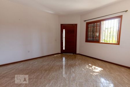 Sala de casa de condomínio à venda com 2 quartos, 80m² em Olaria, Canoas