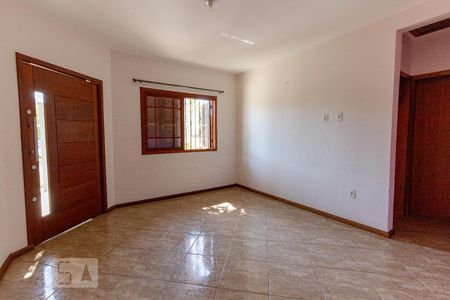 Sala de casa de condomínio à venda com 2 quartos, 80m² em Olaria, Canoas