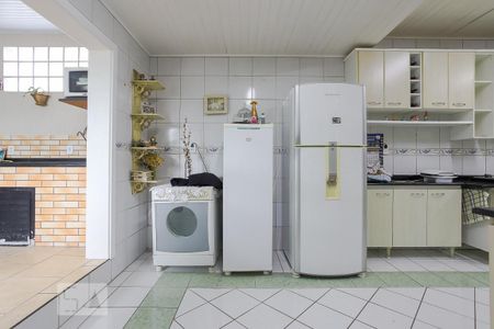 Casa à venda com 430m², 4 quartos e 2 vagas Casa à venda com 430m², 4 quartos e 2 vagasCozinha e Área de Serviço