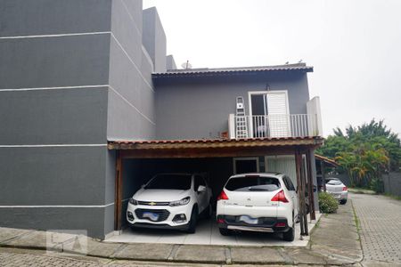 Casa de condomínio à venda com 70m², 2 quartos e 2 vagasFrente da Casa e Garagem