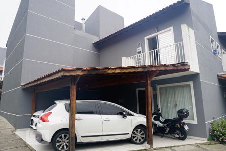 Casa de condomínio à venda com 70m², 2 quartos e 2 vagasFrente da Casa e Garagem