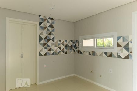 Cozinha de casa de condomínio à venda com 3 quartos, 140m² em Campo Novo, Porto Alegre