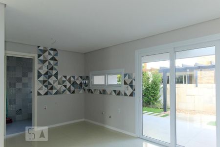 Cozinha de casa de condomínio à venda com 3 quartos, 140m² em Campo Novo, Porto Alegre