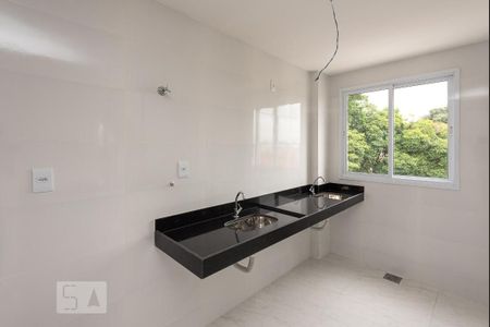 Apartamento à venda com 42m², 2 quartos e 1 vaga Apartamento à venda com 42m², 2 quartos e 1 vagaCozinha e Área de Serviço