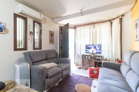 Sala de casa de condomínio à venda com 3 quartos, 153m² em Ipanema, Porto Alegre