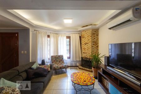 Sala de Estar de casa à venda com 3 quartos, 287m² em Partenon, Porto Alegre