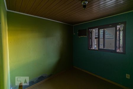 Quarto 1 de casa para alugar com 2 quartos, 80m² em Vila Joao Pessoa, Porto Alegre