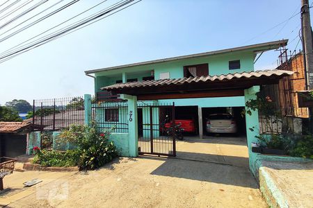 Casa à venda com 120m², 4 quartos e 2 vagas Casa à venda com 120m², 4 quartos e 2 vagasFachada