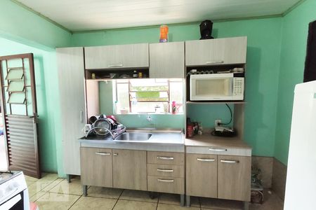 Casa à venda com 120m², 4 quartos e 2 vagas Casa à venda com 120m², 4 quartos e 2 vagasCozinha