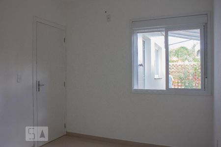 Quarto 2 de casa de condomínio à venda com 2 quartos, 50m² em Rio Branco, Canoas