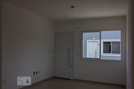 Sala/Cozinha de casa de condomínio à venda com 2 quartos, 50m² em Rio Branco, Canoas