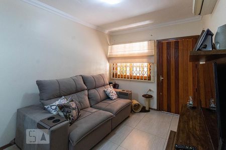 Sala de Estar de casa de condomínio à venda com 3 quartos, 96m² em Partenon, Porto Alegre