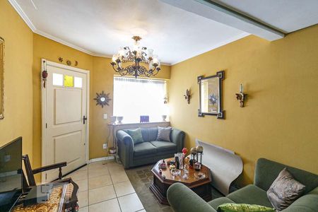 Sala de casa de condomínio à venda com 3 quartos, 190m² em Ipanema, Porto Alegre