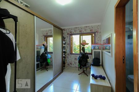 Suíte 1 de casa à venda com 3 quartos, 150m² em Guarujá, Porto Alegre