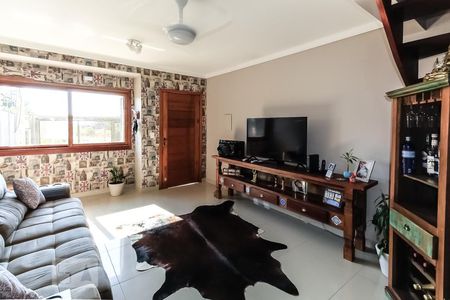 Sala de casa à venda com 3 quartos, 150m² em Guarujá, Porto Alegre
