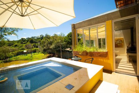 Casa de condomínio à venda com 400m², 4 quartos e 8 vagas Casa de condomínio à venda com 400m², 4 quartos e 8 vagasVaranda com Hidromassagem