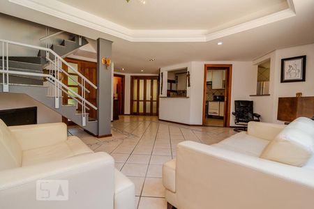 Sala de casa de condomínio à venda com 3 quartos, 300m² em Vila Nova, Porto Alegre