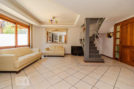 Sala de casa de condomínio à venda com 3 quartos, 300m² em Vila Nova, Porto Alegre