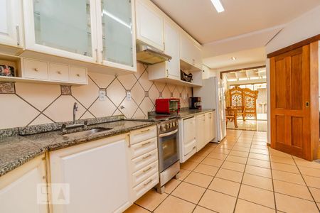 Casa de condomínio à venda com 300m², 3 quartos e 3 vagas Casa de condomínio à venda com 300m², 3 quartos e 3 vagasCozinha