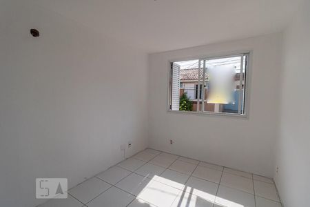 Quarto 1 de casa de condomínio para alugar com 2 quartos, 86m² em Jardim Itu, Porto Alegre
