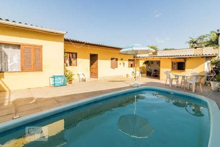 Casa à venda com 319m², 4 quartos e 4 vagas Casa à venda com 319m², 4 quartos e 4 vagasPiscina