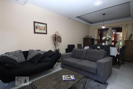 Sala de casa de condomínio à venda com 3 quartos, 150m² em Centro, Canoas