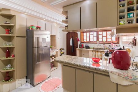 Casa à venda com 274m², 4 quartos e 5 vagas Casa à venda com 274m², 4 quartos e 5 vagasCozinha