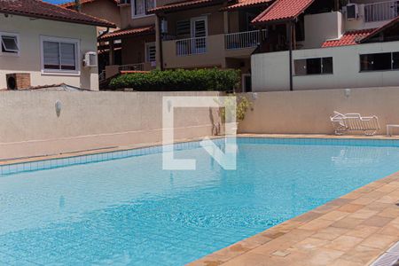 Casa de condomínio à venda com 74m², 2 quartos e 3 vagasÁrea comum - Piscina