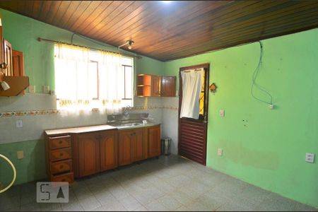 Sala e cozinha de casa à venda com 3 quartos, 120m² em Guajuviras, Canoas