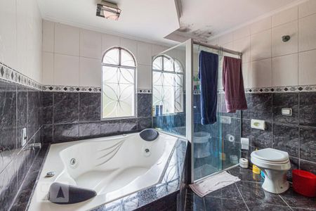 Casa à venda com 220m², 4 quartos e 3 vagasBanheiro da Suite 2