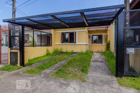 Casa à venda com 62m², 3 quartos e 2 vagas Casa à venda com 62m², 3 quartos e 2 vagasFachada