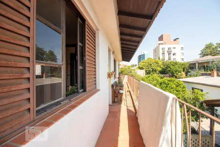 Varanda de casa à venda com 3 quartos, 363m² em Rio Branco, Porto Alegre