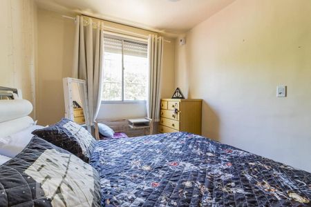 Dormitório2 de apartamento à venda com 2 quartos, 60m² em Vila Nova, Porto Alegre