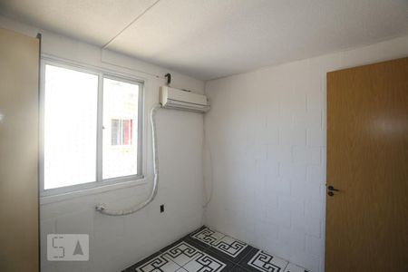 Quarto 1 de apartamento para alugar com 2 quartos, 50m² em Vila Nova, Porto Alegre