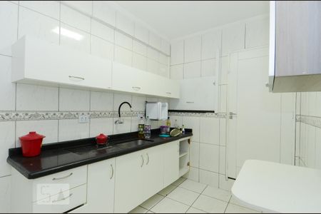 Casa à venda com 411m², 5 quartos e 8 vagasCozinha da Área da Churrasqueira