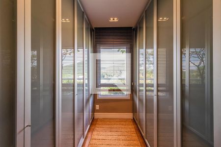 Casa de condomínio à venda com 1054m², 4 quartos e 5 vagasCloset 1 da Suíte 4